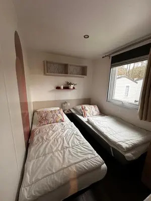 Un ou plusieurs lits dans un hébergement de l'établissement Grand Mobil Home Tout Confort pour 6 personnes - Camping Les Oyats 4 étoiles