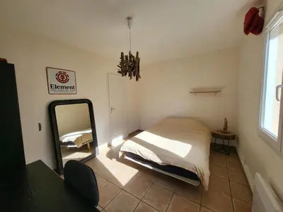 Un ou plusieurs lits dans un hébergement de l'établissement La Casa de Mymy 3 chambres Messanges