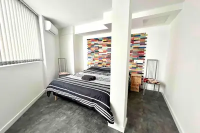 Un ou plusieurs lits dans un hébergement de l'établissement Cosy flat 2 steps from the port 4pers