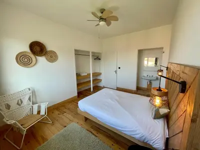 Un ou plusieurs lits dans un hébergement de l'établissement Cowabunga guesthouse - peaceful and spacious, beach is just 200m away