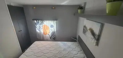 Un ou plusieurs lits dans un hébergement de l'établissement Mobile home Mimizan