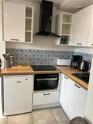 Cuisine ou kitchenette dans l'établissement La Mirella