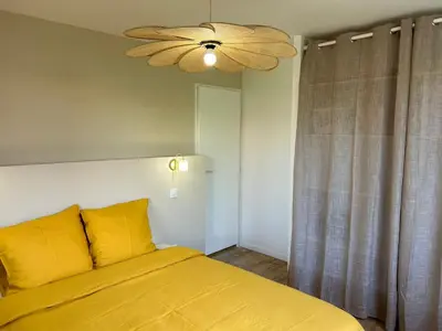 Un ou plusieurs lits dans un hébergement de l'établissement Beach House Paupiette - 150m plage sud