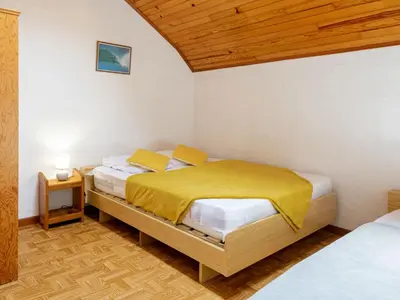Un ou plusieurs lits dans un hébergement de l'établissement Holiday Home Sicard-8 by Interhome
