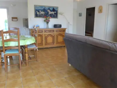 Coin salon dans l'établissement Holiday Home Bosquet aux Ecureuils by Interhome