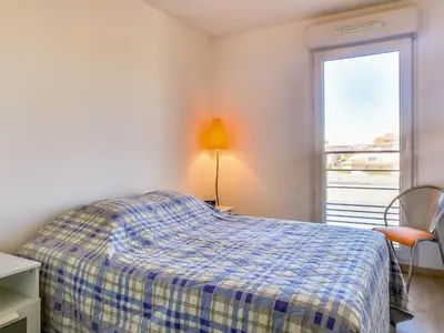 Un ou plusieurs lits dans un hébergement de l'établissement Apartment Cap Key Largo by Interhome