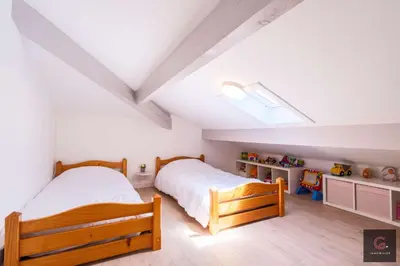Un ou plusieurs lits dans un hébergement de l'établissement Biscarrosse Plage Villa avec piscine pour 12 personnes
