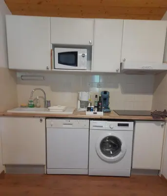 Cuisine ou kitchenette dans l'établissement Cottage prenium tout confort
