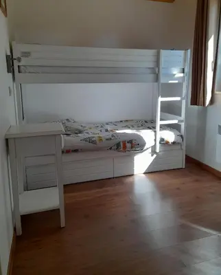 Un ou plusieurs lits dans un hébergement de l'établissement Cottage prenium tout confort