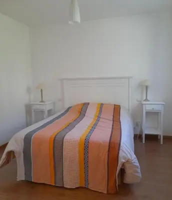Un ou plusieurs lits dans un hébergement de l'établissement Cottage prenium tout confort