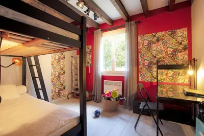 Un ou plusieurs lits dans un hébergement de l'établissement La Maison de Michelle & Jean - pour 10p avec jardin