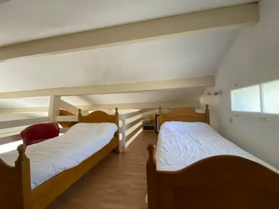 Un ou plusieurs lits dans un hébergement de l'établissement Villa Dreamland à Seignosse océan