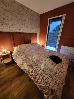 Un ou plusieurs lits dans un hébergement de l'établissement Appartement Domaine du Bost