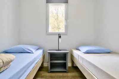 Un ou plusieurs lits dans un hébergement de l'établissement Les Maisons du Domaine du Golf de Pinsolle - maeva Home - Maison 3 pièces 4 personnes - Exclusive - Super Home MAE-5961