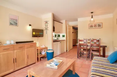 Coin salon dans l'établissement Le Domaine du Golf de Pinsolle - maeva Home - Appartement 2 pièces 3 personnes - Prestige MAE-4431