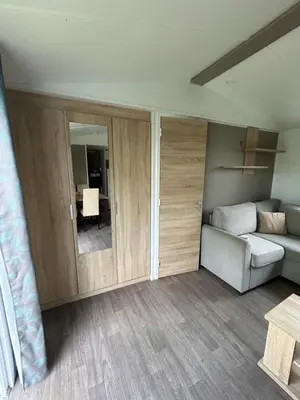 Coin salon dans l'établissement Mobilhome les 3C de mimizan