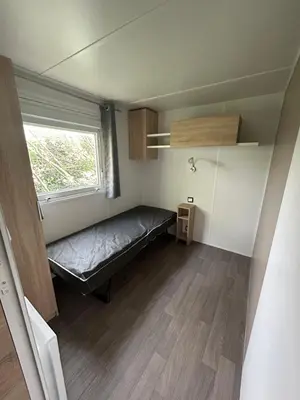 Un ou plusieurs lits dans un hébergement de l'établissement Mobilhome les 3C de mimizan