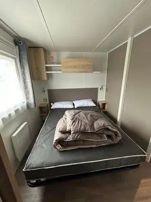 Un ou plusieurs lits dans un hébergement de l'établissement Mobilhome les 3C de mimizan