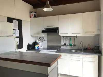 Cuisine ou kitchenette dans l'établissement Maison proche du sentier du littoral Gujan-Mestras