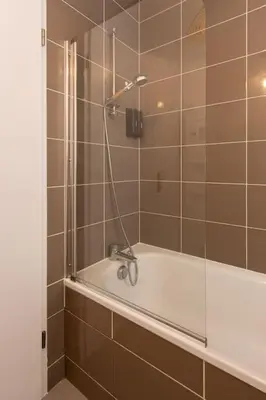 Salle de bains dans l'établissement Appartement des grands lacs