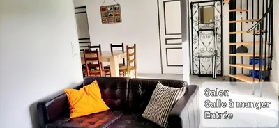 Coin salon dans l'établissement Appartement cosy 4 personnes