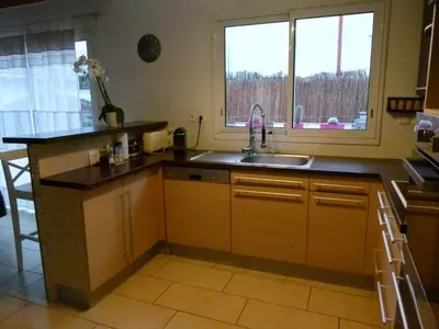 Cuisine ou kitchenette dans l'établissement Maison au coeur de Capbreton