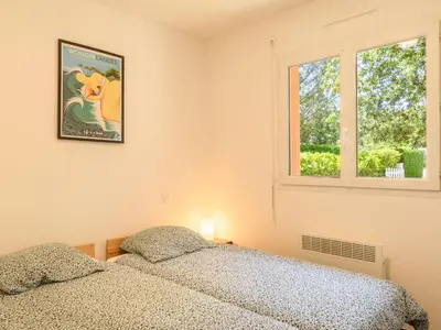 Un ou plusieurs lits dans un hébergement de l'établissement Holiday Home La Lette I Tilleuls by Interhome