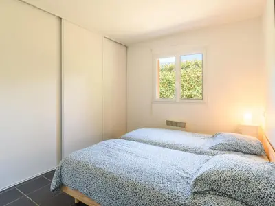 Un ou plusieurs lits dans un hébergement de l'établissement Holiday Home La Lette I Tilleuls by Interhome