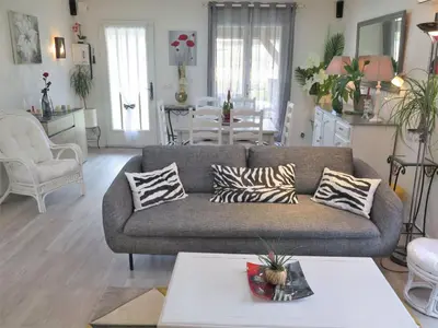 Coin salon dans l'établissement Holiday Home Les Camélias by Interhome