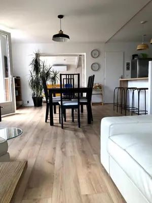 Coin salon dans l'établissement Charmante Maison Entre Lac et Océan