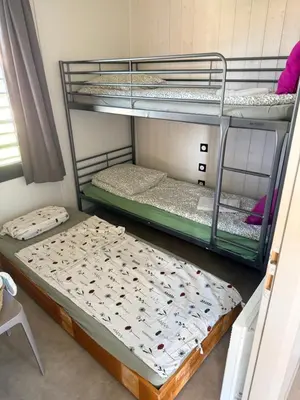 Un ou plusieurs lits dans un hébergement de l'établissement Cottage 79 Landes nature