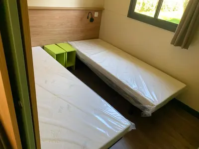 Un ou plusieurs lits dans un hébergement de l'établissement L'orée des Landes