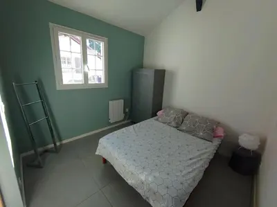 Un ou plusieurs lits dans un hébergement de l'établissement Logement Nature Plages Forêts