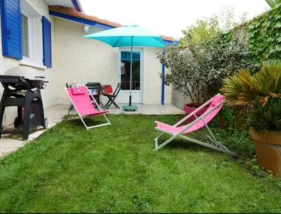 Jardin de l'établissement T2 Climatise sur le BASSIN D ARCACHON