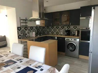 Cuisine ou kitchenette dans l'établissement maison typique bassin d'Arcachon