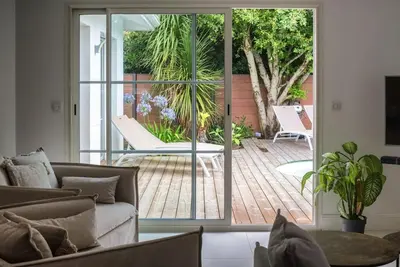 Coin salon dans l'établissement Villa proche du bassin -piscine
