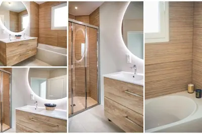 Salle de bains dans l'établissement Villa proche du bassin -piscine