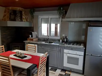 Cuisine ou kitchenette dans l'établissement LE BARROQUE