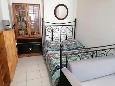 Un ou plusieurs lits dans un hébergement de l'établissement Appartement agreable sur le bassin d'arcachon