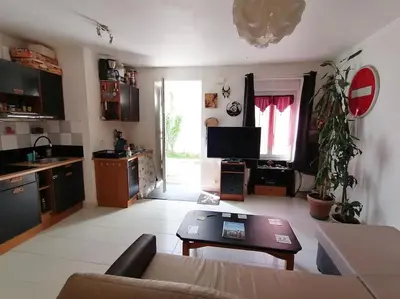 Télévision ou salle de divertissement dans l'établissement Appartement agreable sur le bassin d'arcachon