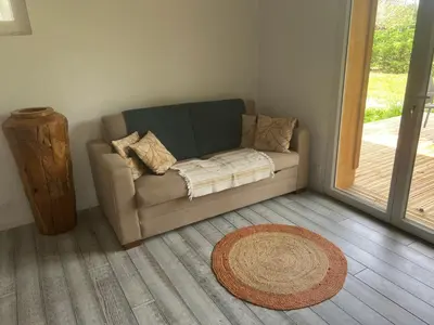 Coin salon dans l'établissement Location airial Landais