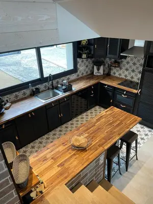 Cuisine ou kitchenette dans l'établissement Petit paradis