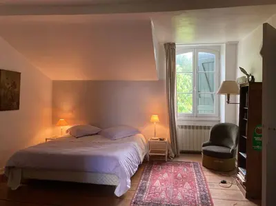 Un ou plusieurs lits dans un hébergement de l'établissement Appartement proche de l Adour