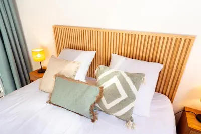 Un ou plusieurs lits dans un hébergement de l'établissement Les Balcons du Golfe - Cozy & moderne Moliets Plage