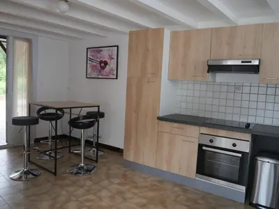 Cuisine ou kitchenette dans l'établissement Les Bruyères - Maison