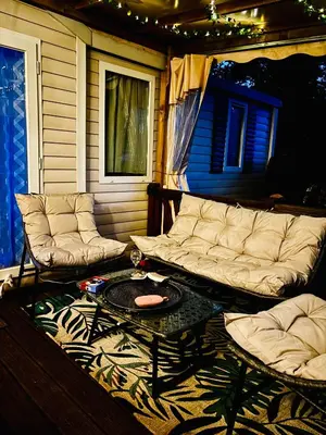 Coin salon dans l'établissement Superbe Mobilehome 3 ch, climatisé tout confort