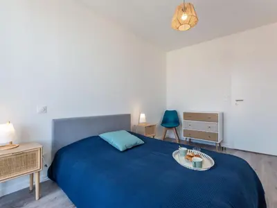 Un ou plusieurs lits dans un hébergement de l'établissement Apartment Cap Océan-18 by Interhome