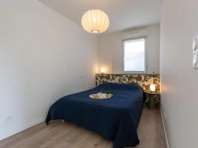 Un ou plusieurs lits dans un hébergement de l'établissement Apartment Cap Océan-5 by Interhome