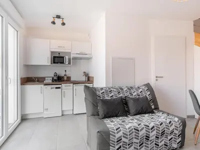 Cuisine ou kitchenette dans l'établissement Apartment SC G01 by Interhome