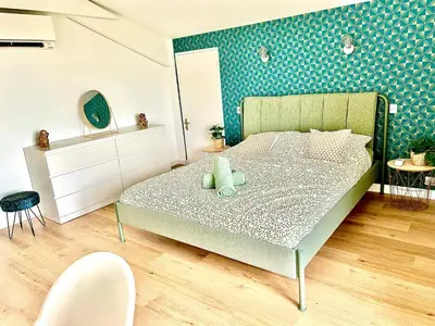 Un ou plusieurs lits dans un hébergement de l'établissement La villa Landaise avec piscine